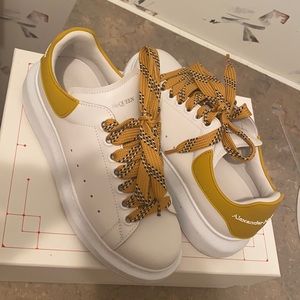 Alexandria McQueen. White and mustard